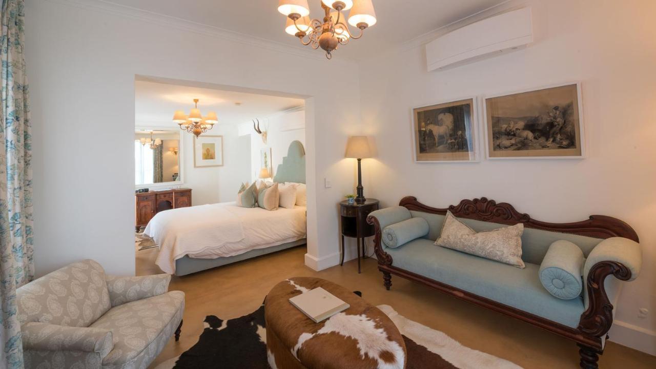 Drostdy Hotel Graaff Reinet Bagian luar foto A suite at the Cape Heritage