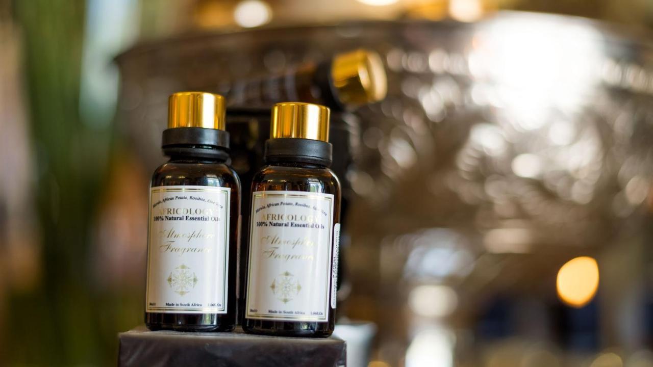 Drostdy Hotel Graaff Reinet Bagian luar foto Essential oil bottles