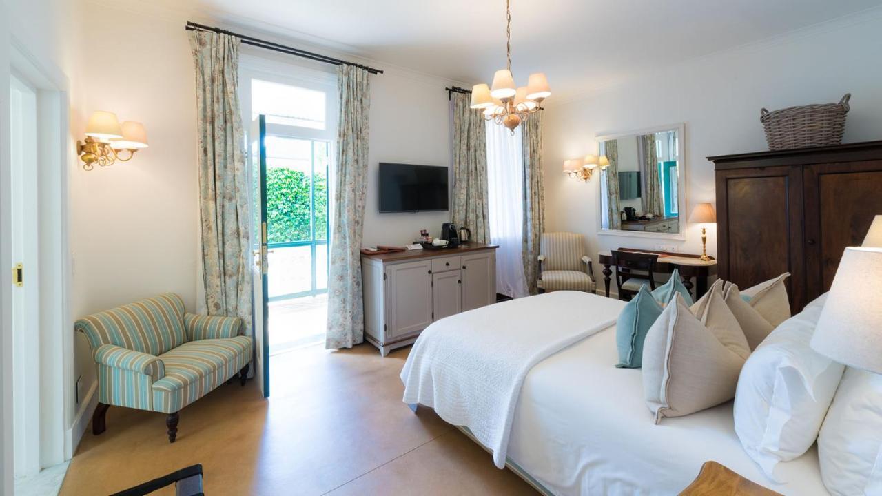 Drostdy Hotel Graaff Reinet Bagian luar foto A room at the Cape Heritage
