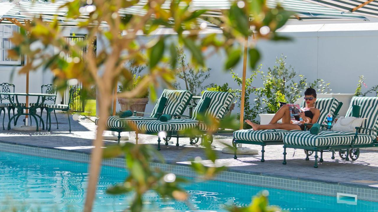 Drostdy Hotel Graaff Reinet Bagian luar foto The pool at the Beverly Hills Hotel