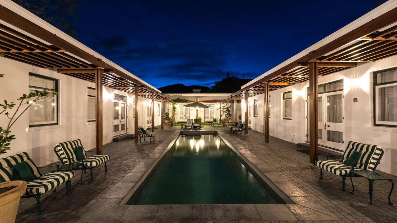 Drostdy Hotel Graaff Reinet Bagian luar foto The pool at the hotel