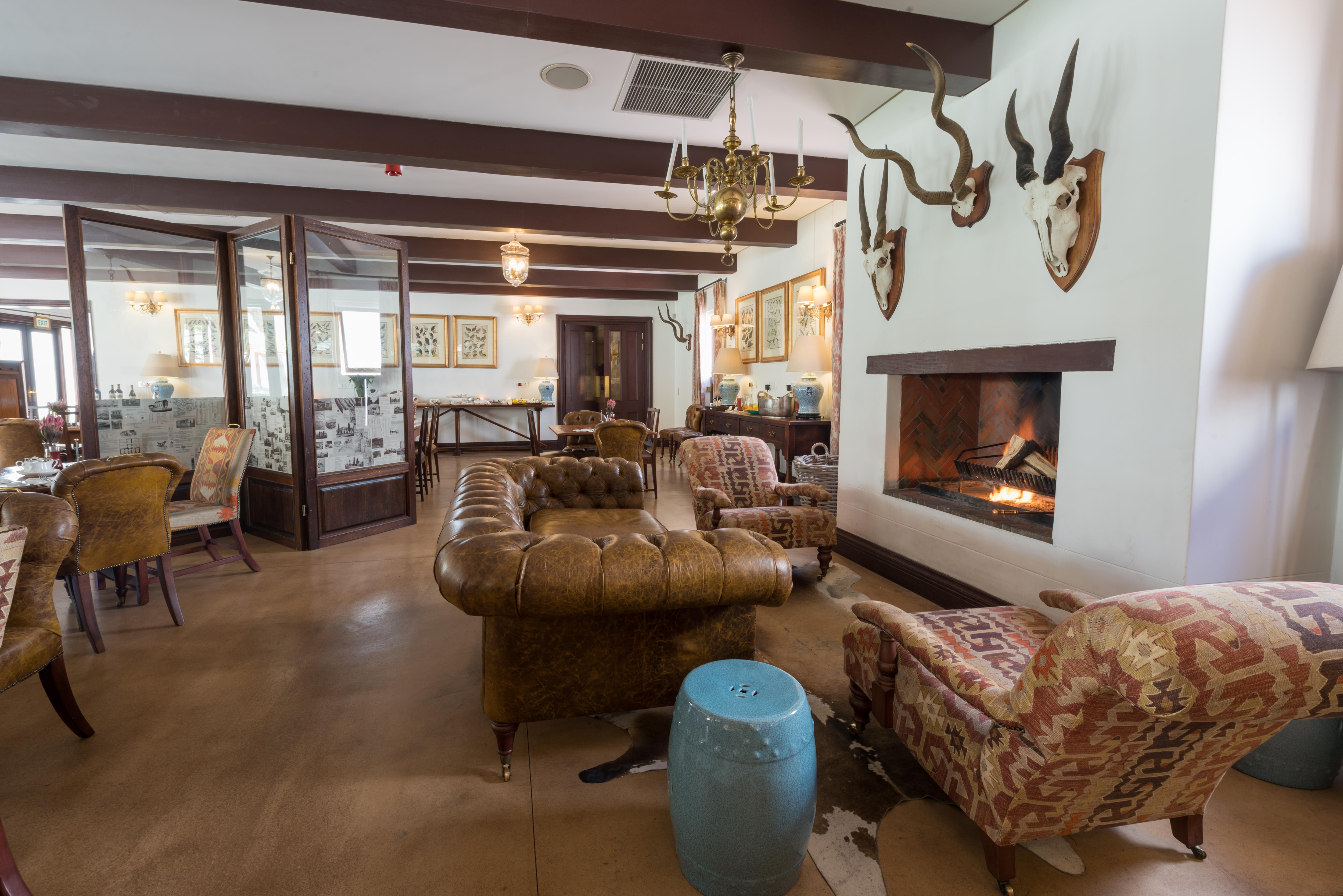 Drostdy Hotel Graaff Reinet Bagian luar foto The interior of the hotel